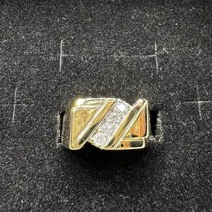 Man’s 14KT yellow gold ring w/4 round diamonds in diagonal pattern. Size…